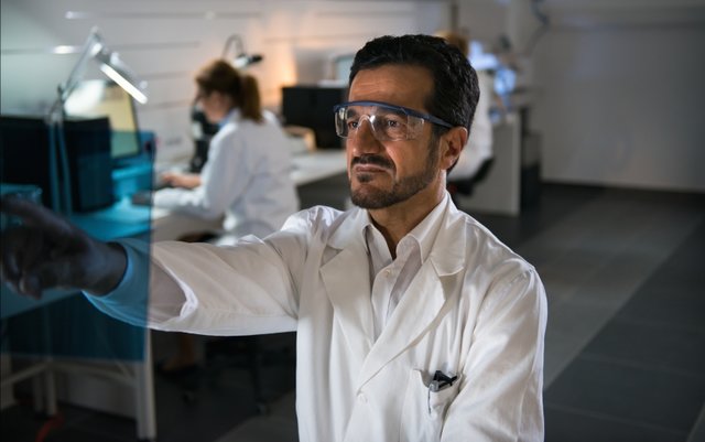 Scientist Working In The Futuristic Laboratory